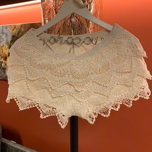 Super cute off-white lace Skort! Made by Rewind. Size Medium